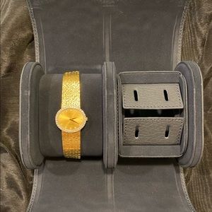 Piaget Women’s 18k Gold with diamonds watch